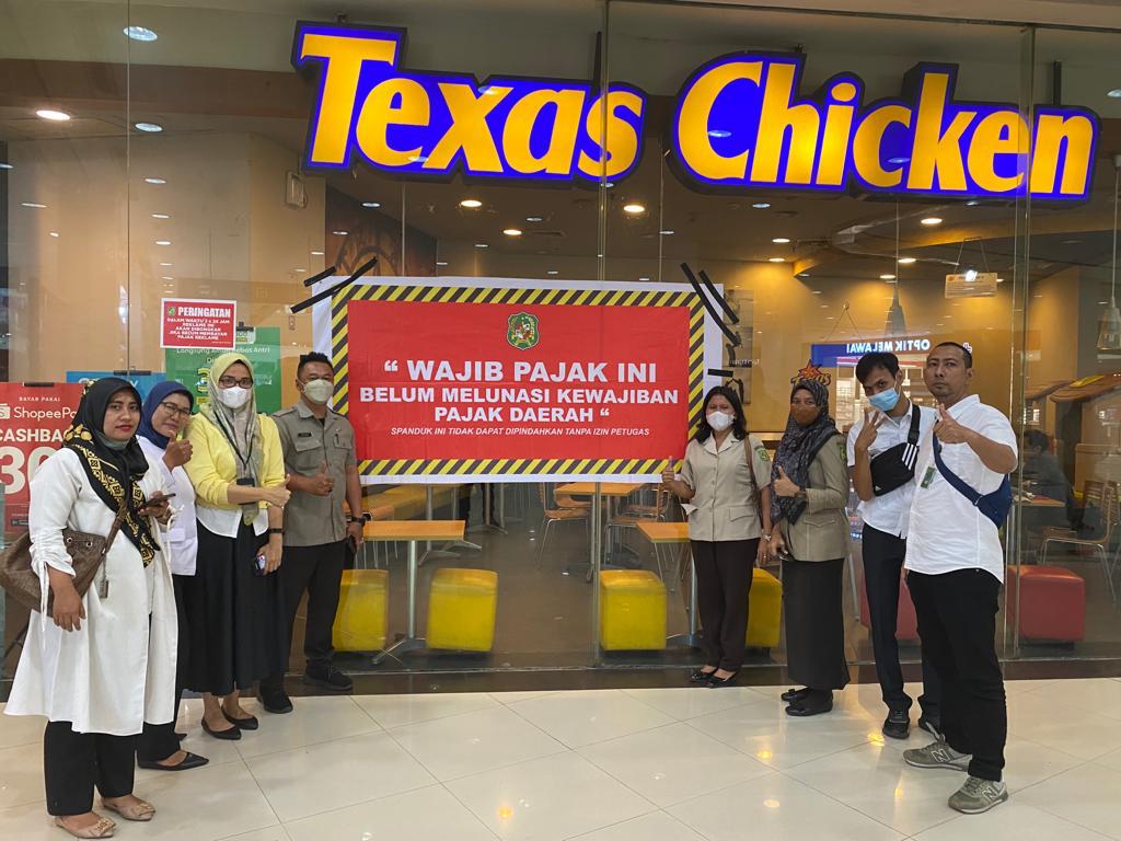 TEXAS CHICKEN MENUNGGAK PAJAK RESTORAN